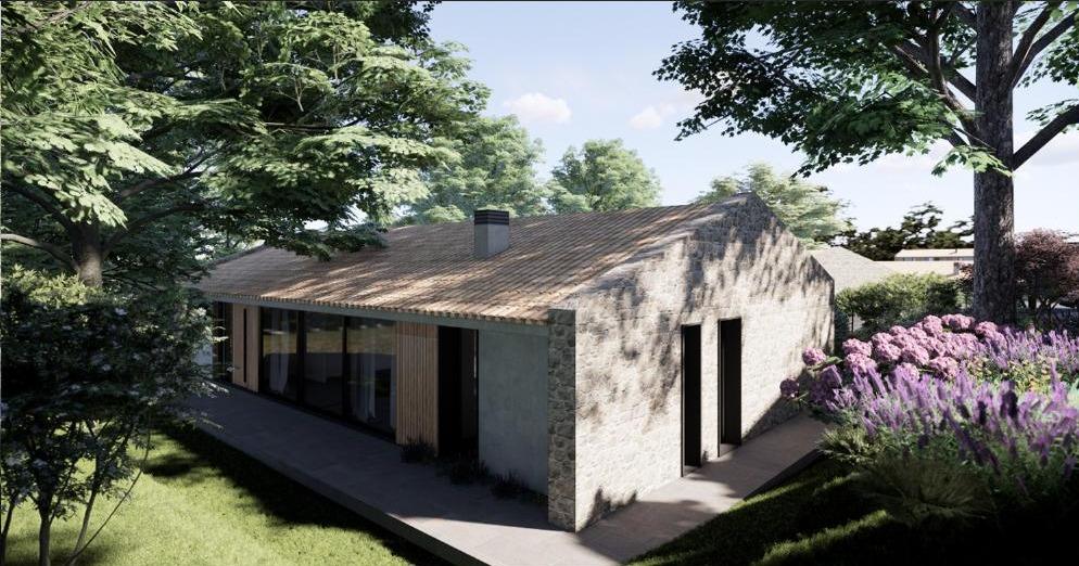 Vivienda 3 · volumen de piedra entre el arbolado