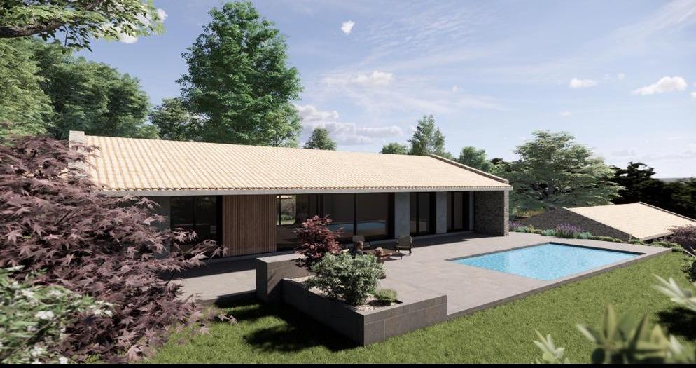 Vivienda 5 · jardín y porche cubierto